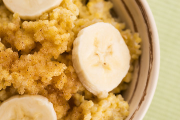 Image showing Fresh millet porridge with banana