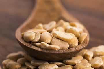 Image showing broad bean dry on wooden table