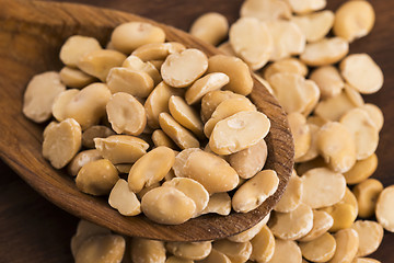 Image showing broad bean dry on wooden table