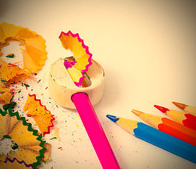 Image showing colored pencils, sharpener and shavings