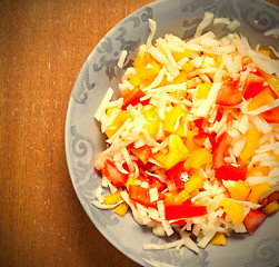 Image showing Assorted salad with fresh vegetables in plate