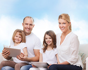 Image showing happy family with tablet pc computers