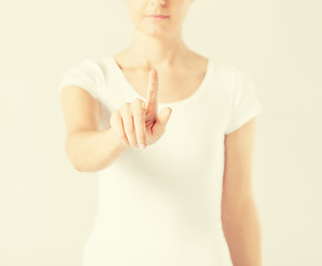 Image showing woman with finger up