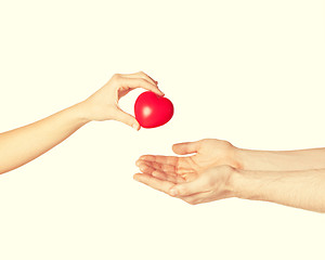 Image showing woman and man hands with heart