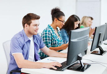 Image showing student with computer studying at school