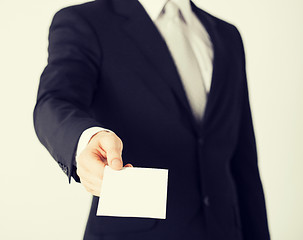 Image showing man hand with blank paper