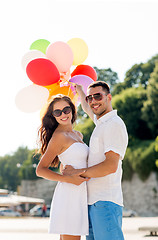 Image showing smiling couple in city