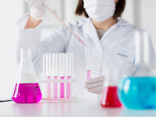 Image showing close up of scientist making test in lab