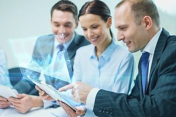 Image showing business team with tablet pc having discussion