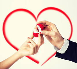 Image showing couple hands with engagement ring