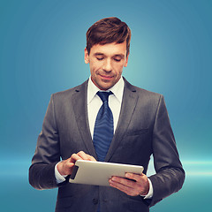 Image showing buisnessman with tablet pc