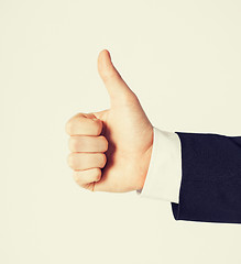 Image showing man showing thumbs up