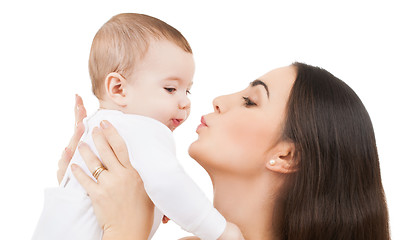 Image showing mother kissing her baby