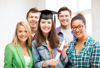 Image showing girl in graduation cap with certificate