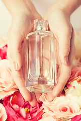 Image showing woman's hands showing perfume