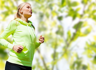 Image showing happy woman running or jogging