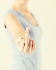 Image showing woman showing middle finger