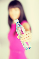 Image showing sporty woman with bottle of water