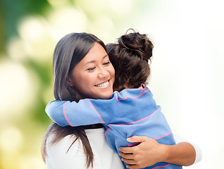 Image showing happy mother and daughter hugging