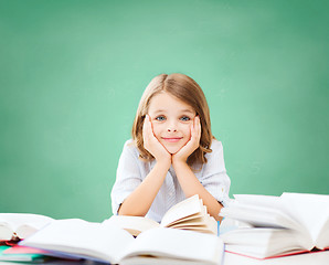 Image showing happy student girl with books at school