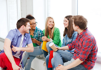 Image showing students communicating and laughing at school