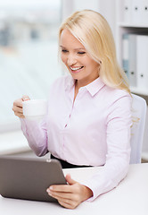 Image showing smiling businesswoman or student with tablet pc