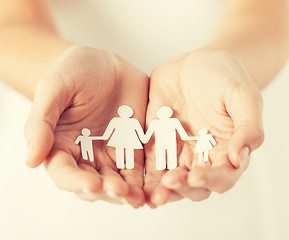 Image showing womans hands with paper man family