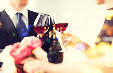 Image showing engaged couple with wine glasses