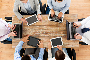 Image showing business team with laptop and tablet pc