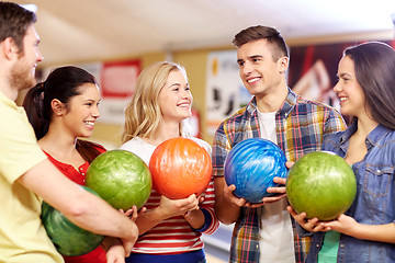 Image showing happy friends in bowling club