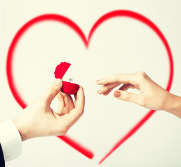 Image showing couple with wedding ring and gift box