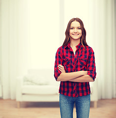 Image showing smiling young woman in casual clothes