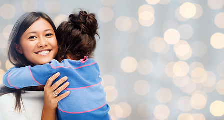 Image showing happy mother and daughter hugging