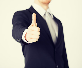 Image showing man showing thumbs up