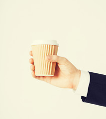 Image showing man hand holding take away coffee