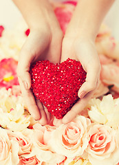 Image showing woman's hands holding heart