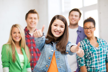 Image showing students showing thumbs up at school