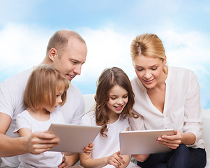 Image showing happy family with tablet pc computers