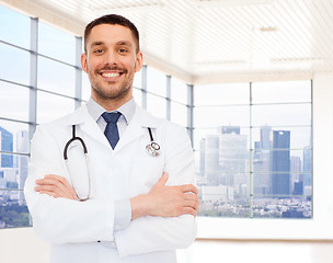 Image showing smiling male doctor with stethoscope