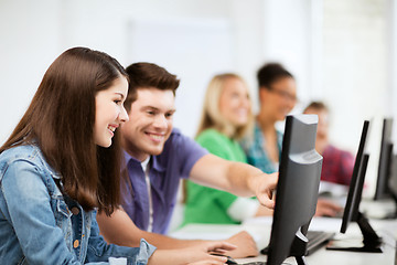 Image showing students with computers studying at school