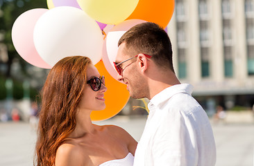 Image showing smiling couple in city