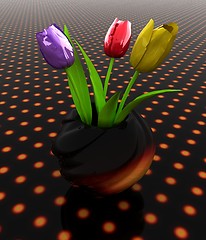 Image showing Tulips with leaf in vase