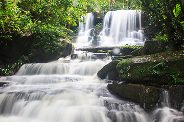 Image showing waterfall and rocks covered with moss