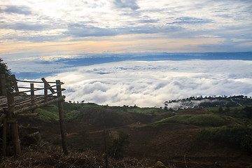 Image showing sea of fog with forests as foreground