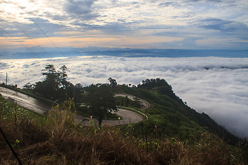 Image showing sea of fog with forests as foreground