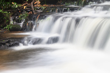 Image showing waterfall and rocks covered with moss