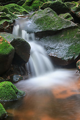 Image showing waterfall and rocks covered with moss