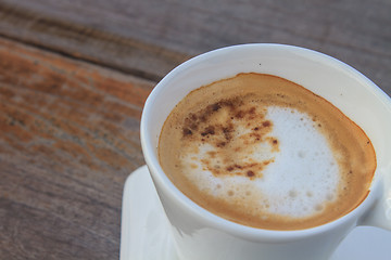 Image showing  cappuccino coffee on wooden table