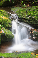 Image showing waterfall and rocks covered with moss