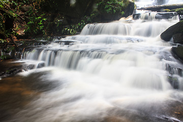 Image showing waterfall and rocks covered with moss